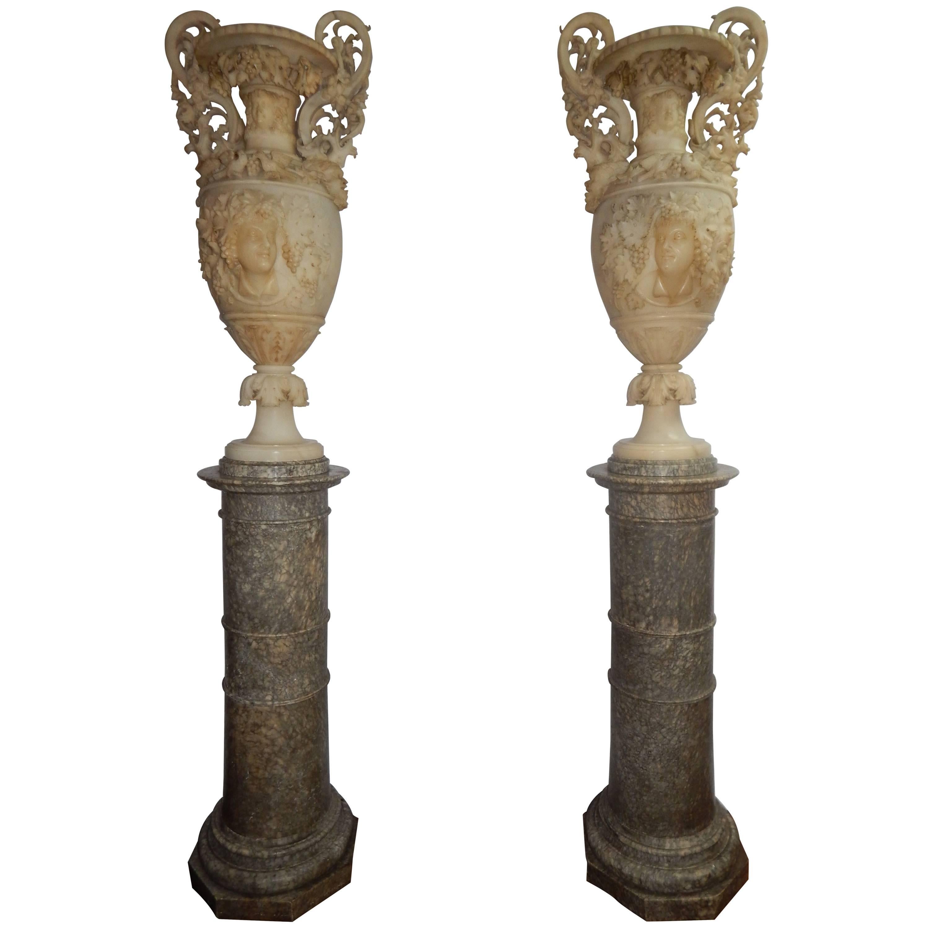 Monumental Pair of Carved Alabaster Urns and Pedestals