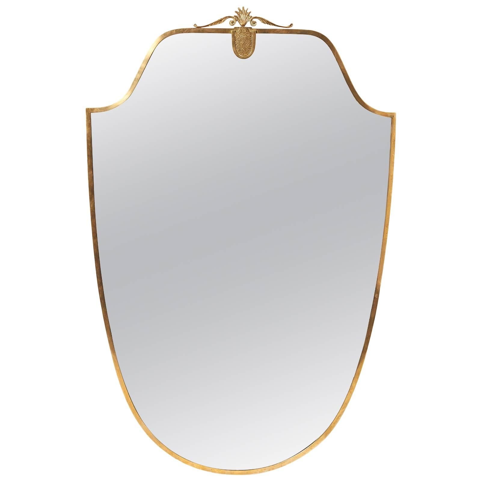 Italian Brass Shield Shaped Framed Mirror For Sale