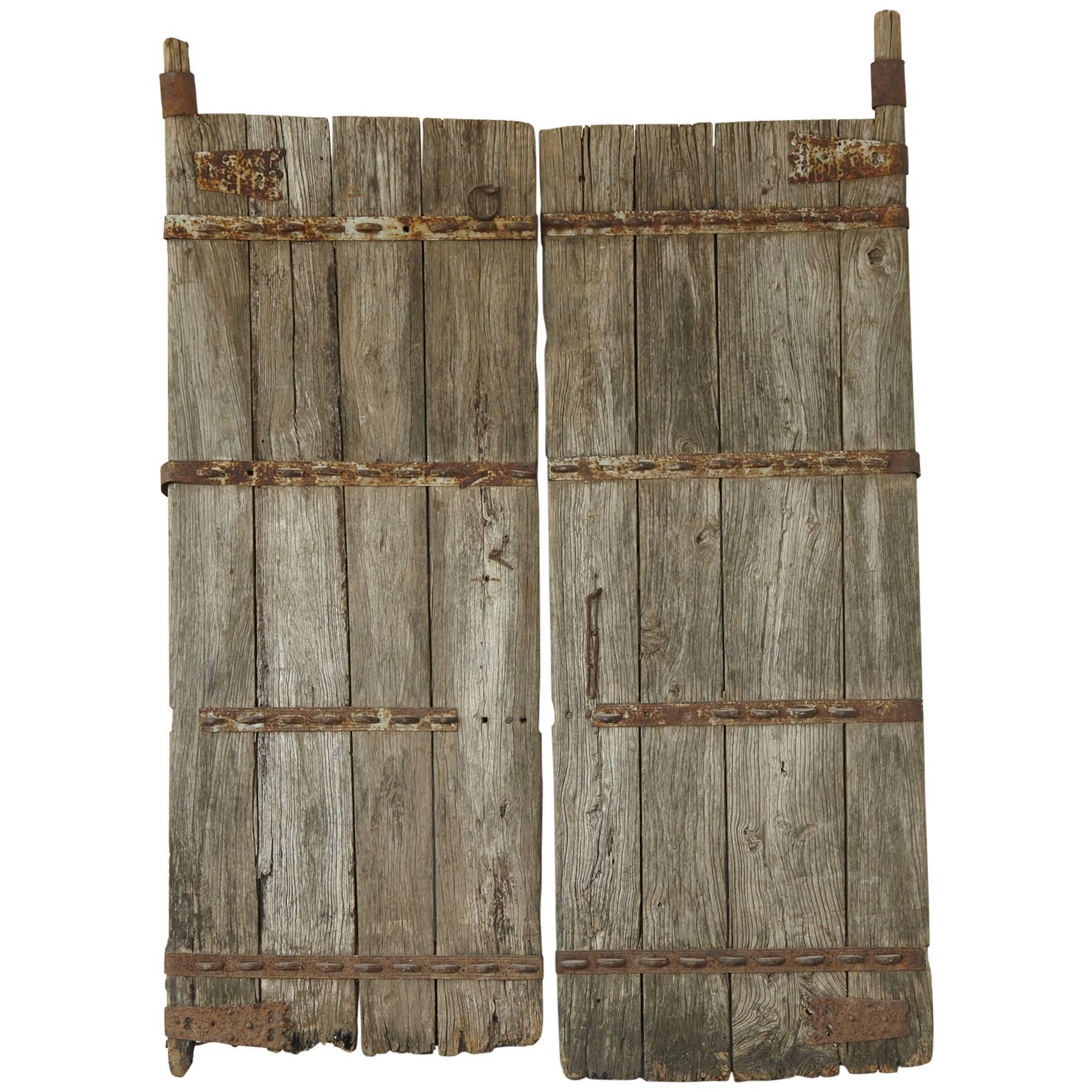 Pair of Large Antique Chinese Oak Gate Doors For Sale