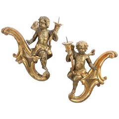 Italian Pair of Rococo Giltwood Figural Wall Prickets Sconces, 18th Century