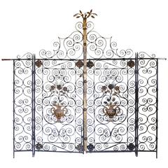 Pair of Early 20th Century Continental Wrought Iron and Toll Work Garden Gates