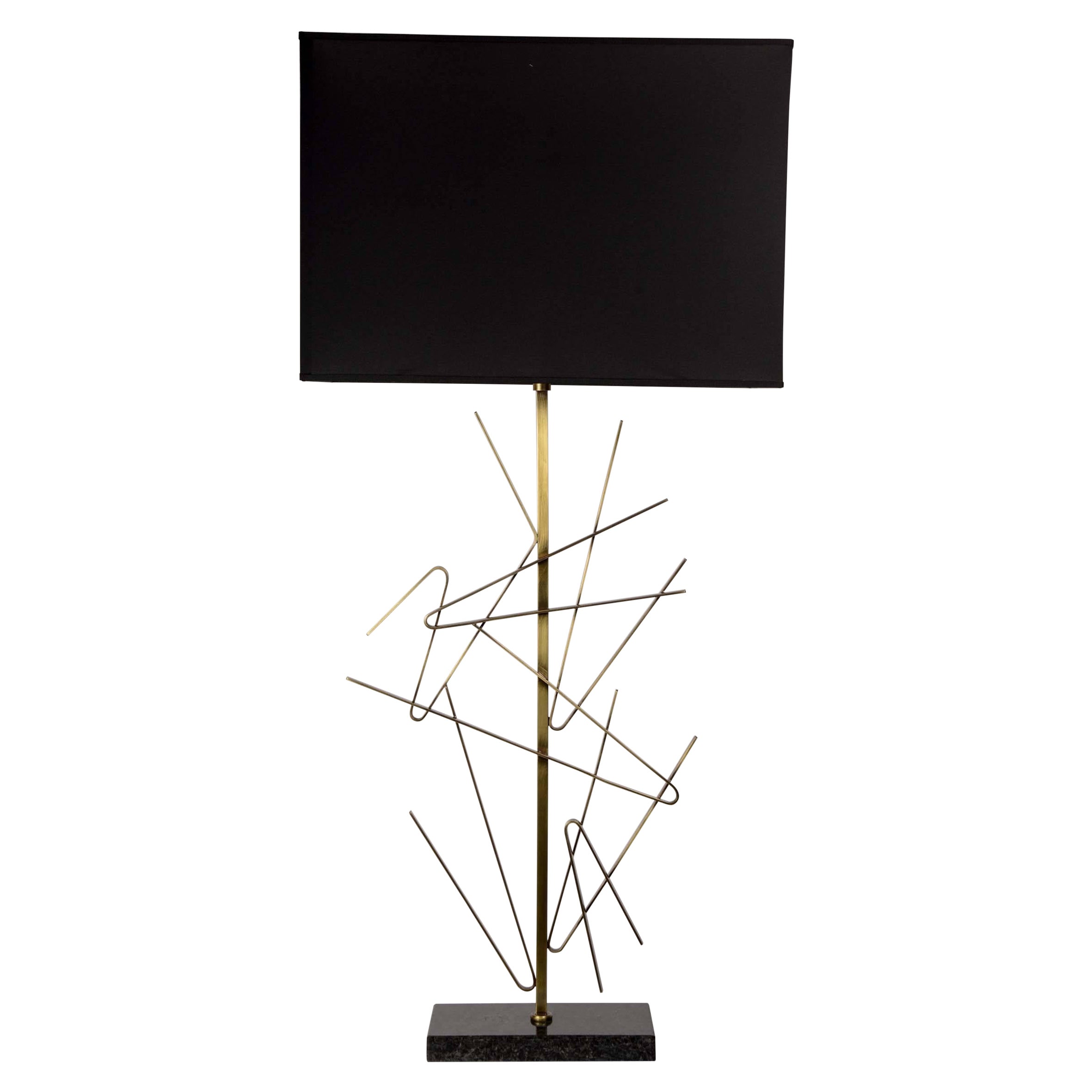 Pair of brass sculptural lamps
