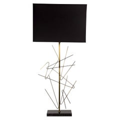 Pair of brass sculptural lamps