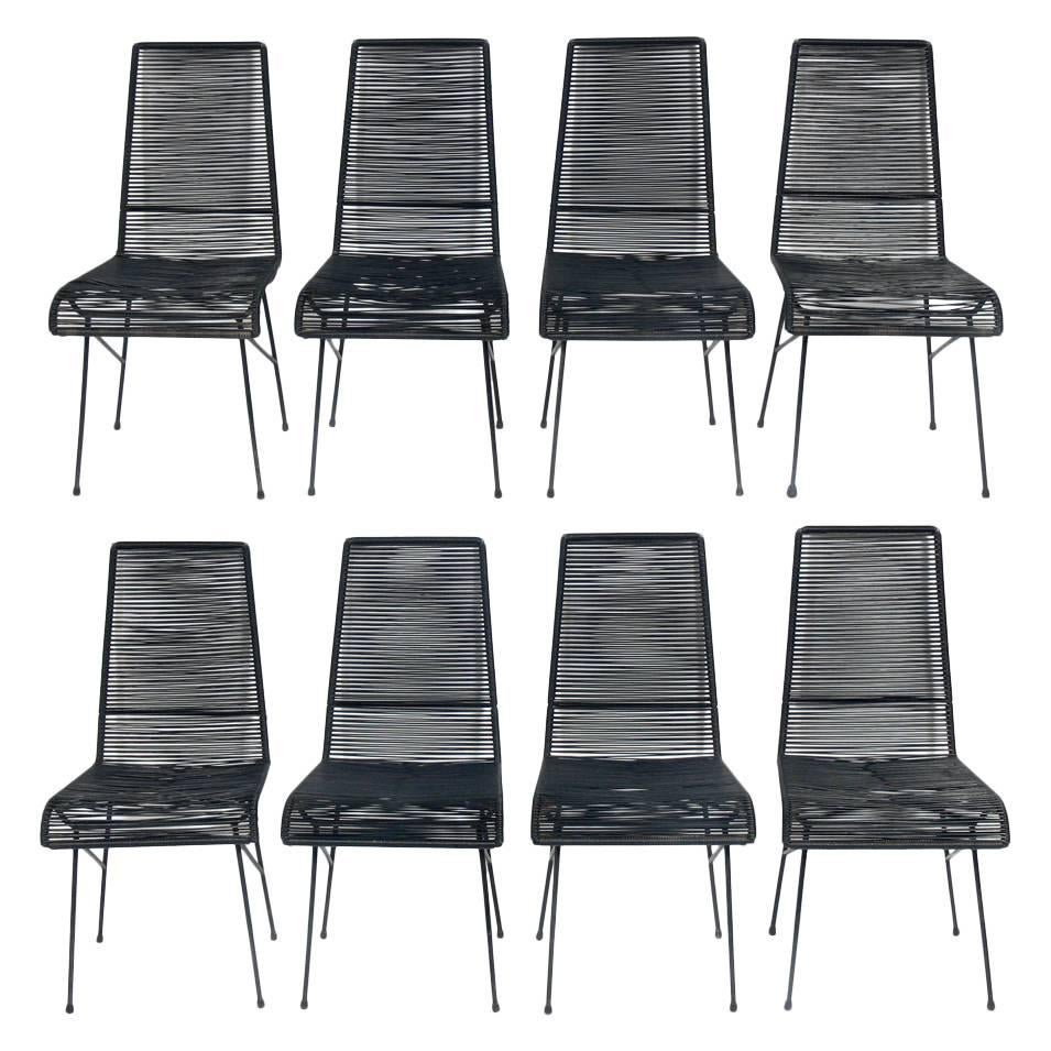 Set of eight tall iron and cord chairs, probably American, circa 1950s. They have a very California Modern vibe and could be manufactured by Van Keppel and Green or Alan Gould. They can be used outdoors or indoors.