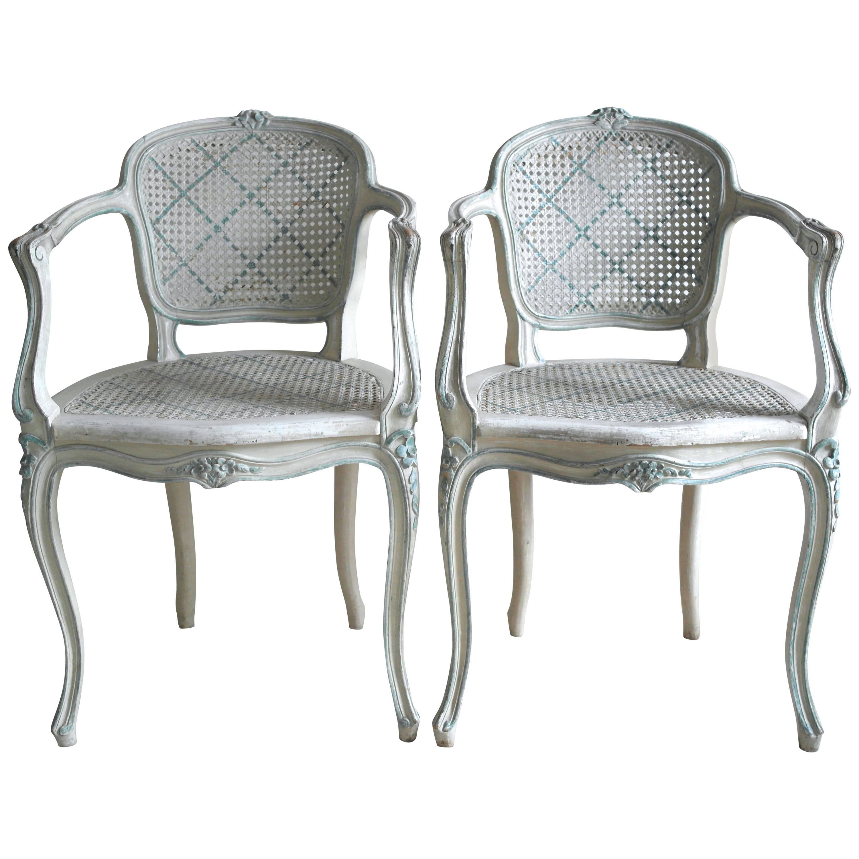  Pair of French Original Painted Caned Chairs For Sale