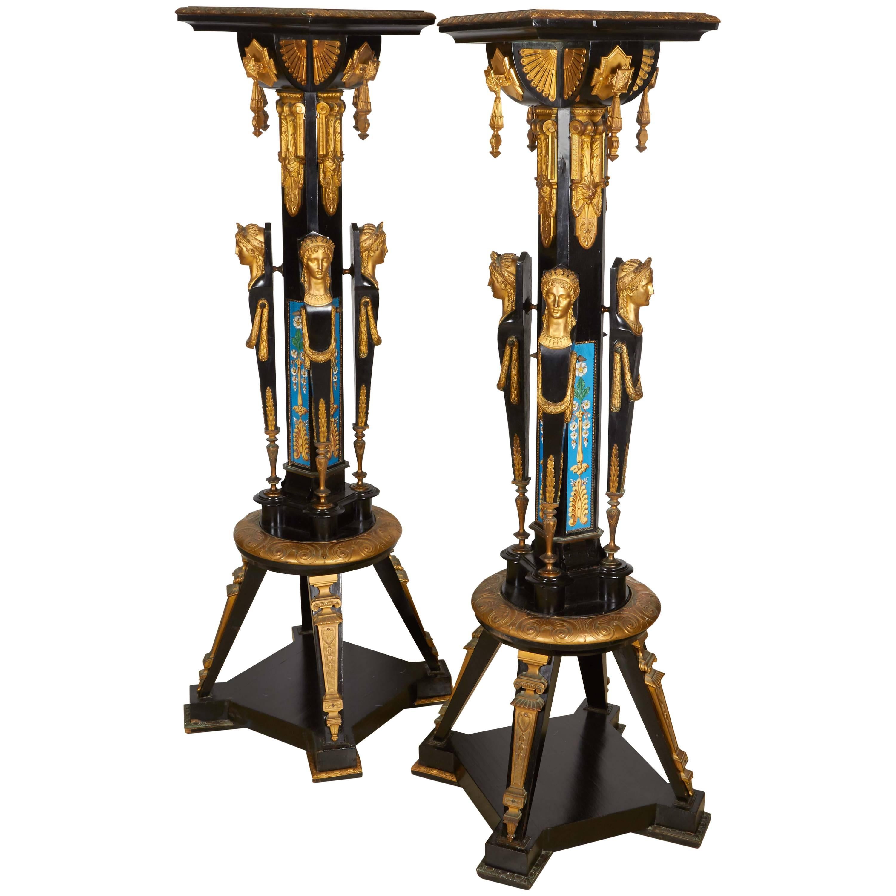 Highly Important Pair of Neo Grec Ormolu and Porcelain Mounted Ebony Torchieres