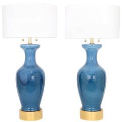 Pair of Monumental Blue Glaze Ceramic Lamps Mounted on Gilded Wood Bases