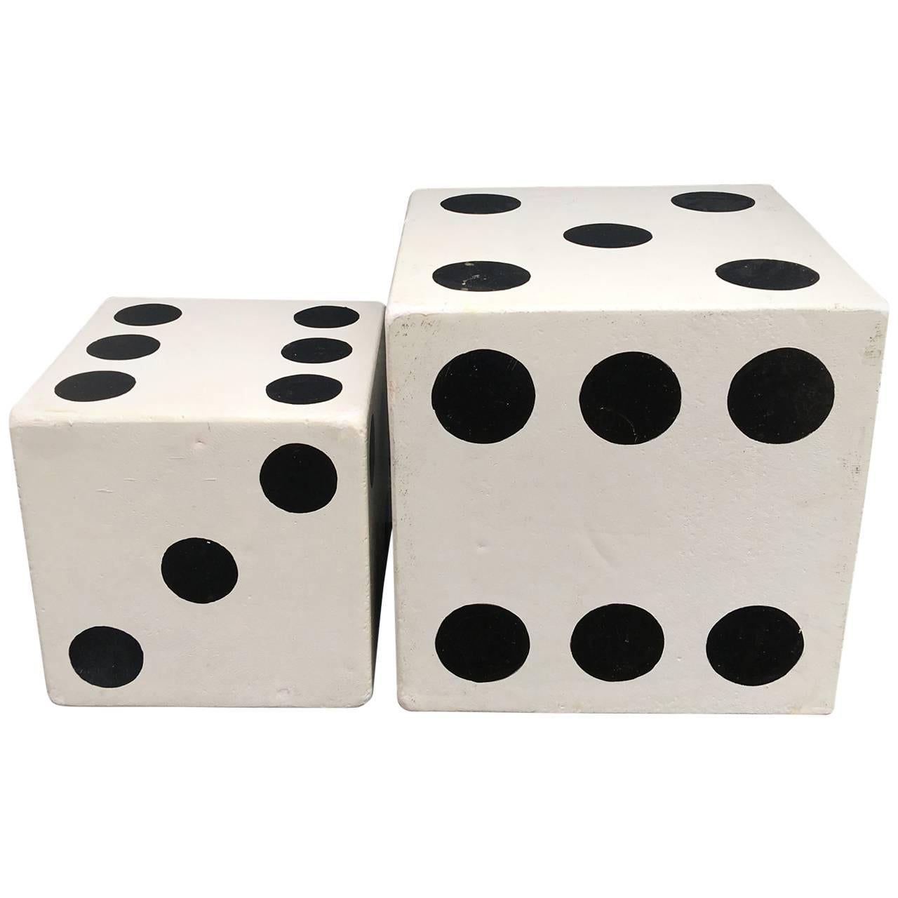 One small and one large end tables in the shape of a dice.