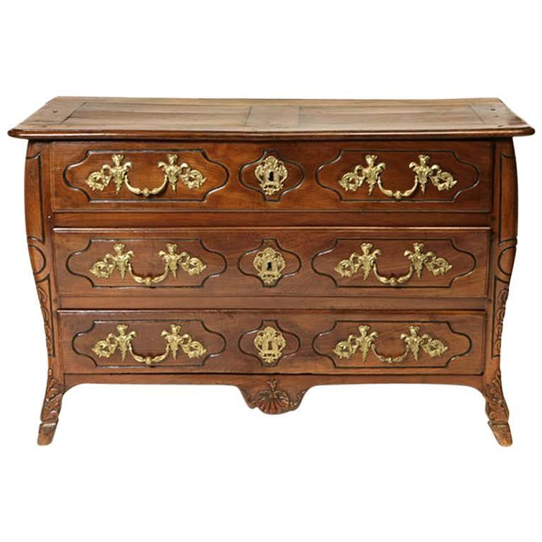 18th Century French Provincial Regence Carved Walnut Commode For Sale