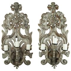 A Pair of 18th Century Italian Carved and Painted Three Candle Appliques
