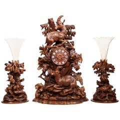 19th Century Swiss Black Forest Carved Walnut Clock with Matching Vases