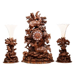 19th Century Swiss Black Forest Carved Walnut Clock with Matching Vases