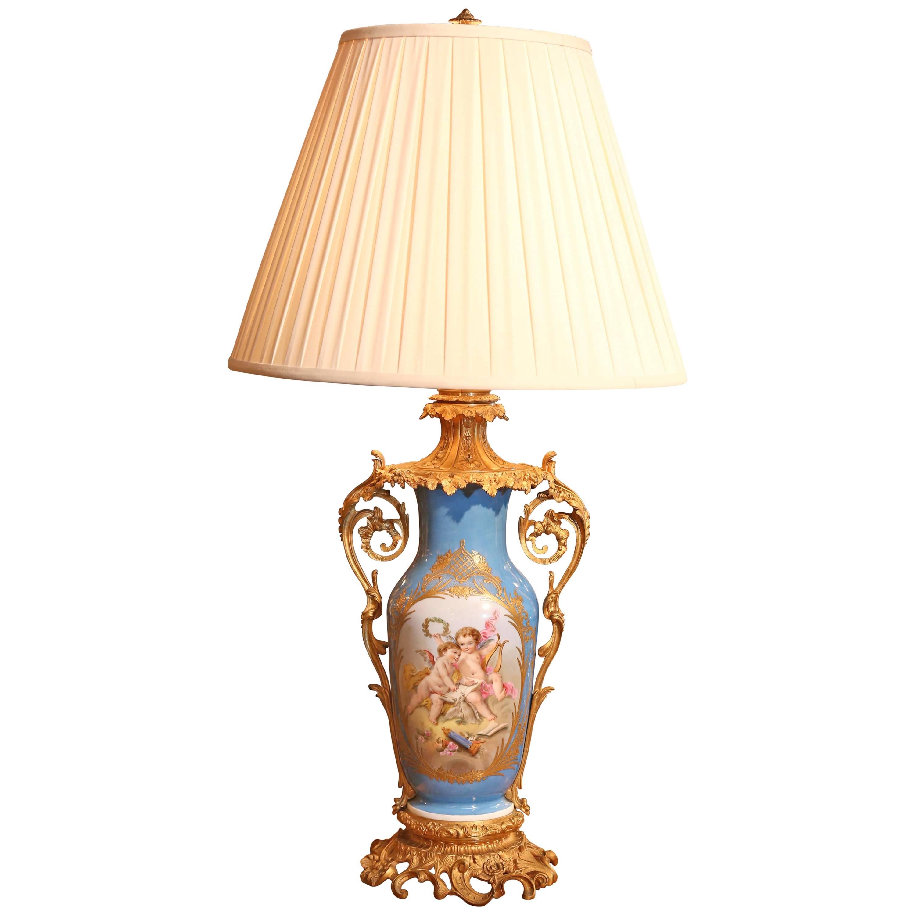 French Sèvres Porcelain Lamp in Celeste Blue with Hand-Painted Reserves