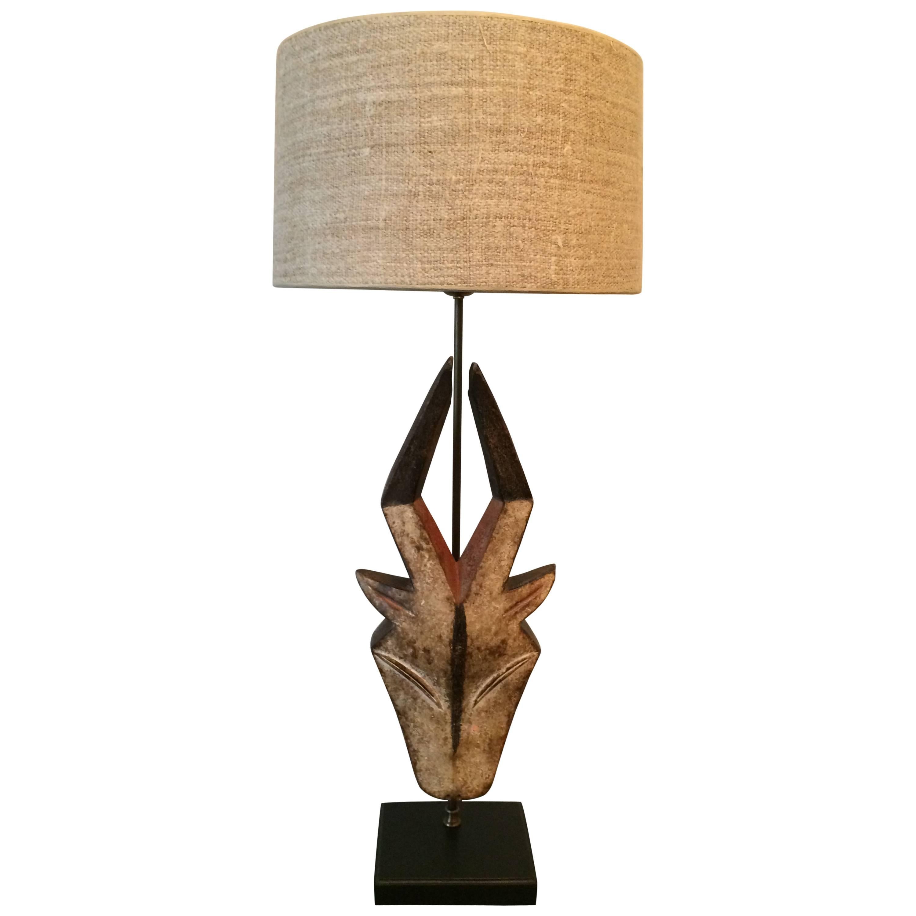 African Antilope Head Mask Mounted as a Table Lamp For Sale