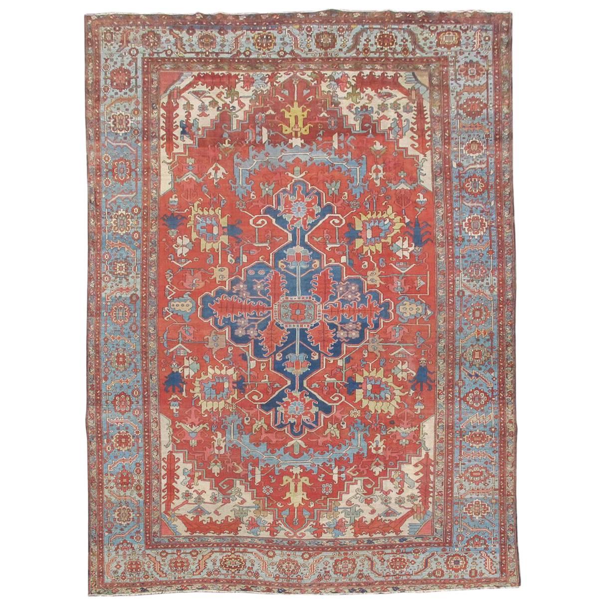 Late 19th Century Red and Blue Indigo Serapi Carpet