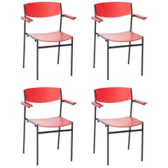 Set of four GIJS VAN DER SLUIS Sluijs red industrial armrest chairs