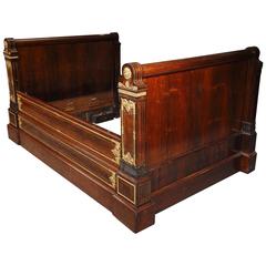 Antique Bed in Mahogany Veneer and Gilt Bronze, Charles X