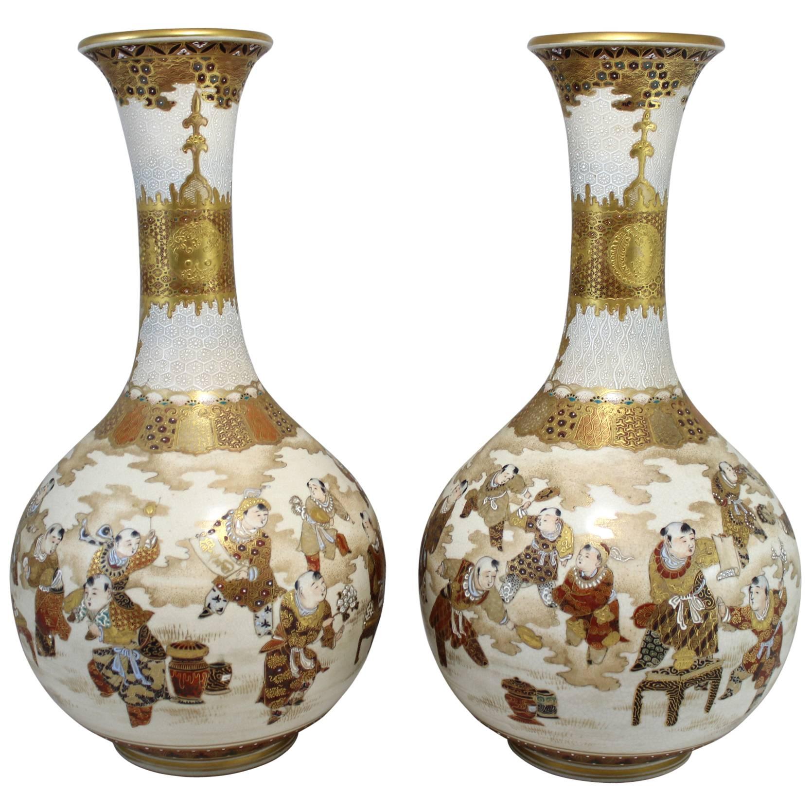Pair of Late 19th Century Japanese Satsuma Vases with Figural Decoration