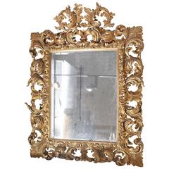 Heavily Carved and Gilt Italian Baroque Mirror
