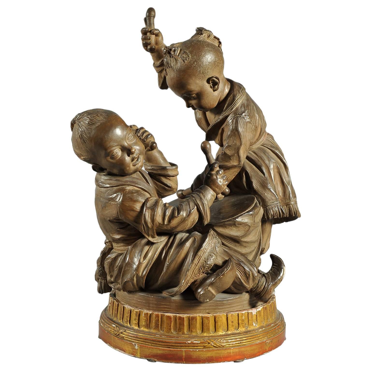 Terracotta Sculpture "Chinese Children with Drum" For Sale