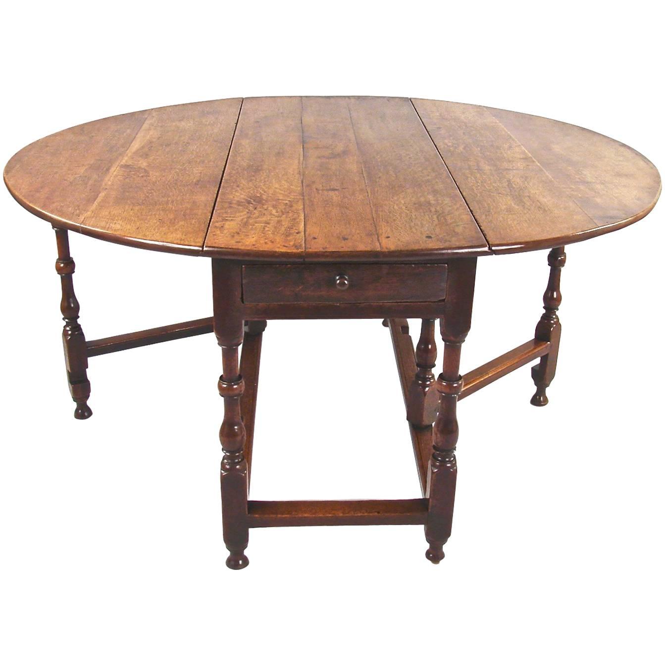 English Late 17th Century Oak Drop-Leaf Table with Drawer