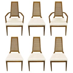 Sleek, circa 1950s Modern Walnut and Cane Dining Chairs