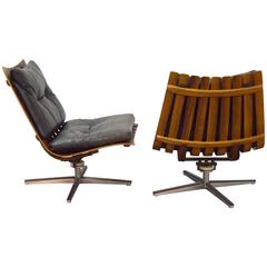 Pair of Hans Brattrud Rosewood Swivel Lounge Chairs