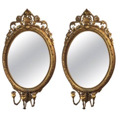 Pair of Louis XV Style Carved and Giltwood Girandole Mirrors