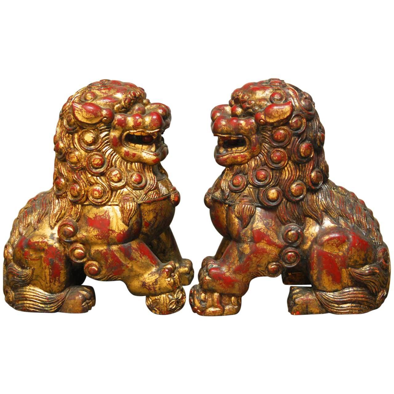 Pair of Large Chinese Gilt Temple Foo Dogs For Sale at 1stdibs