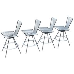 Set of Four Swivel String Barstools in the Manner of Allan Gould 1
