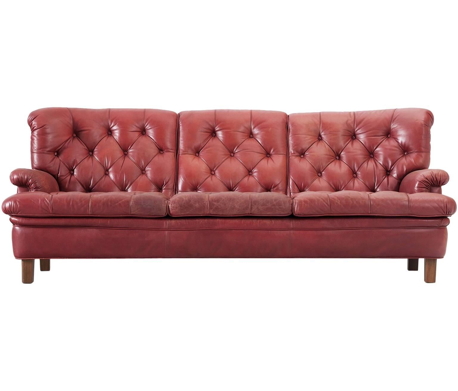 Arne Norell Three-Seat Sofa in Patinated Red Leather