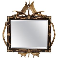 19th Century Black Forest Mirror with Antlers and Carved Deer Medallions