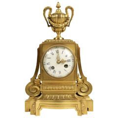 Mantle Clock in Gold Gilt Bronze 19th Century in the Manner of Louis XVI