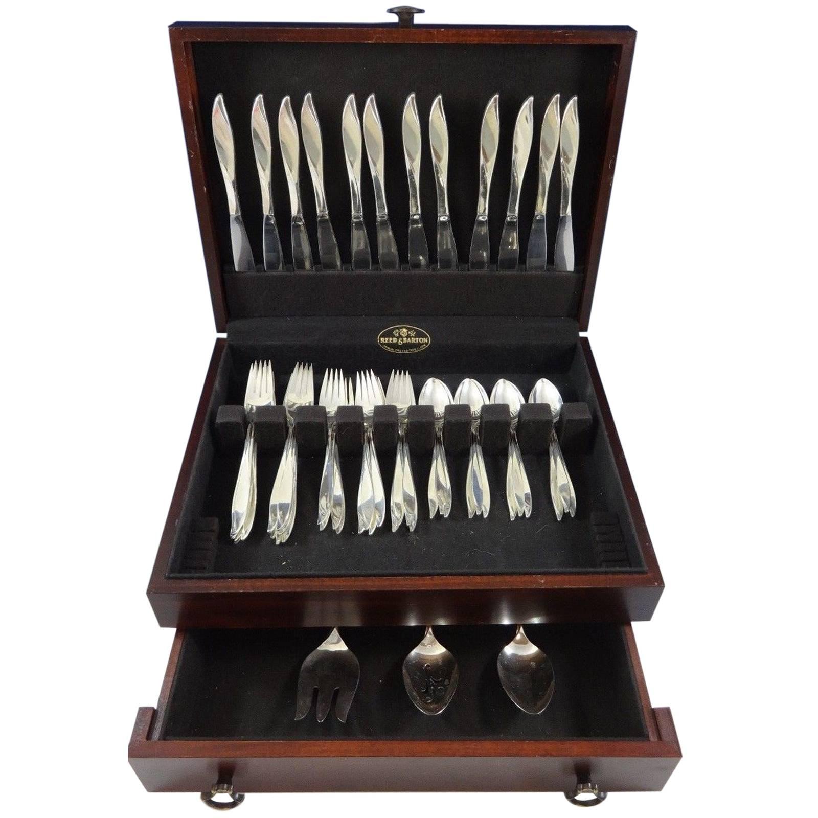 Beautiful Vivant by Oneida sterling silver flatware set of 51 pieces. This set includes:

12 knives, 9