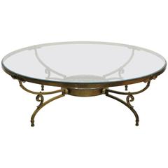 Round Bronze and Glass Coffee Table by Arturo Pani