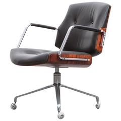 1960's brown wood and black leather Swivel Chair by Fabricius and Kastholm 'd'