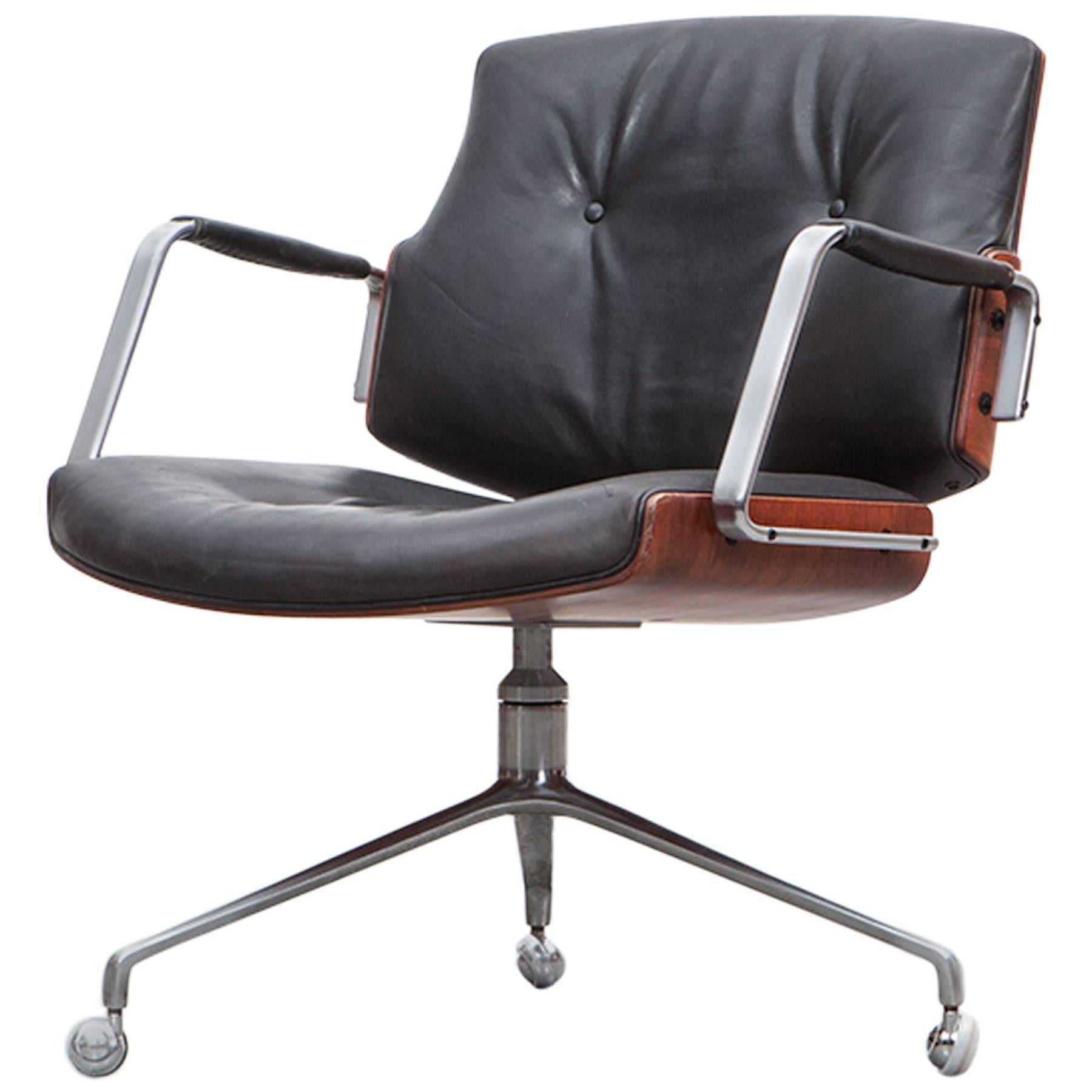1960's brown wood and black leather Swivel Chair by Fabricius and Kastholm 'f'