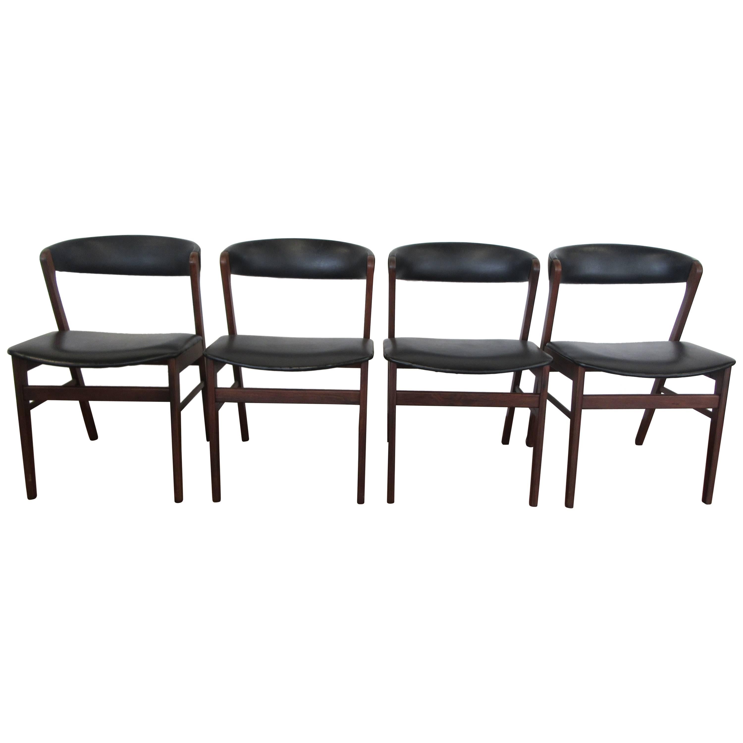 Set of Four Kai Kristiansen Rosewood Chairs Upholstered in Black Naugahyde