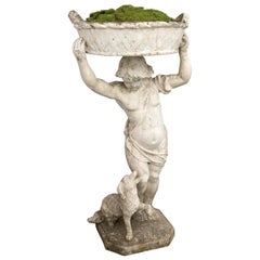 Antique Statue of a Boy Holding a Planter Basket