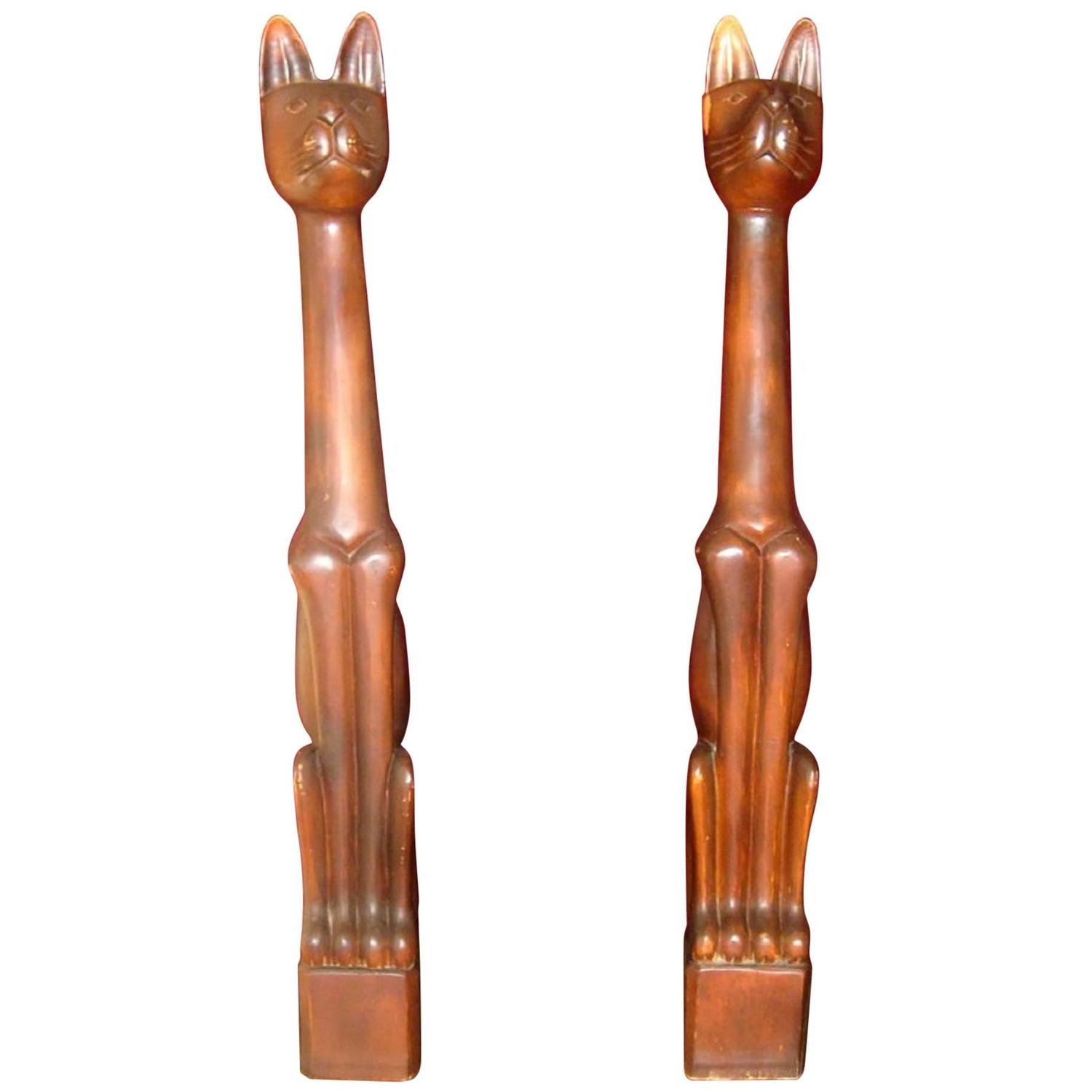 tall wooden carved cats