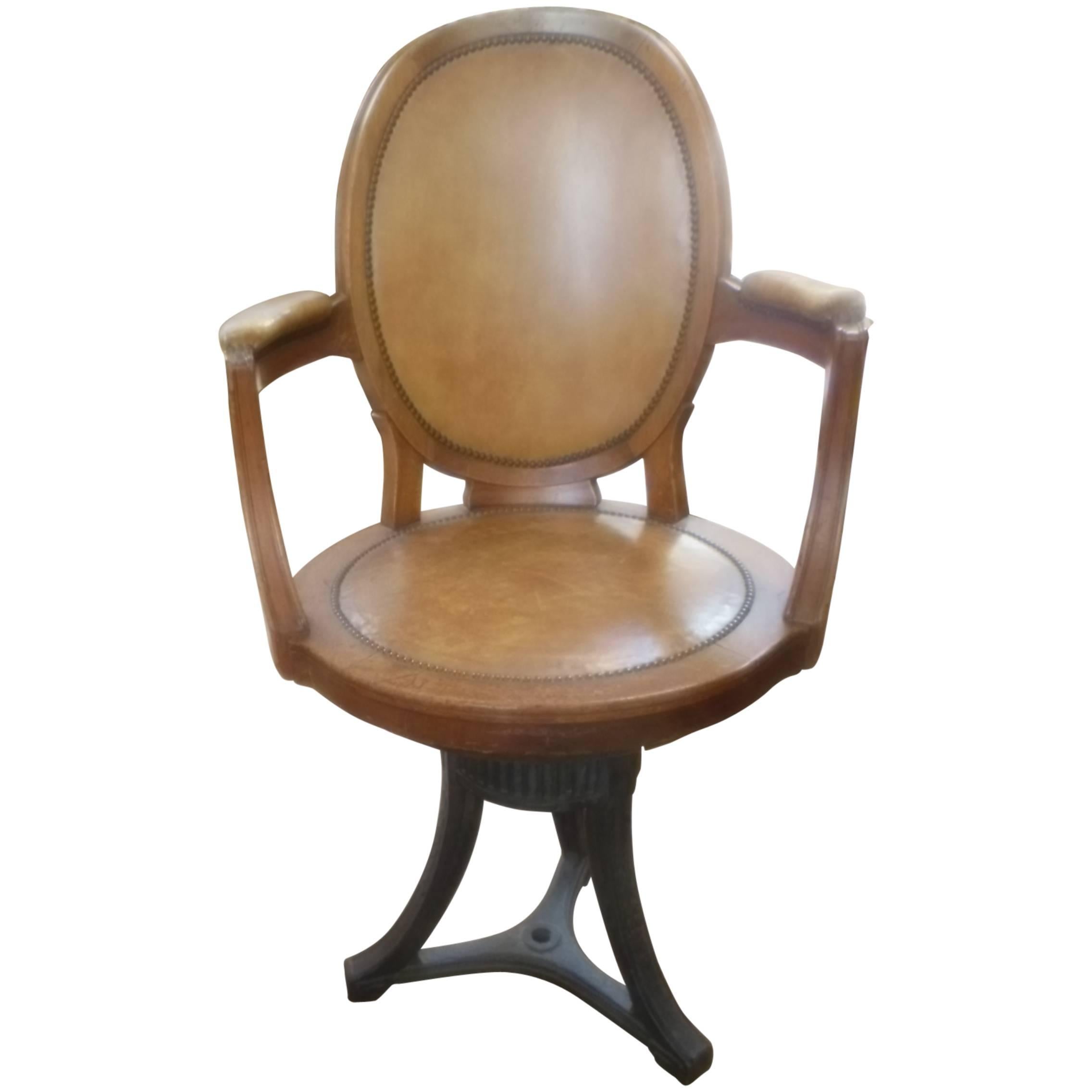 Empire Leather and Oak Swivel Chair