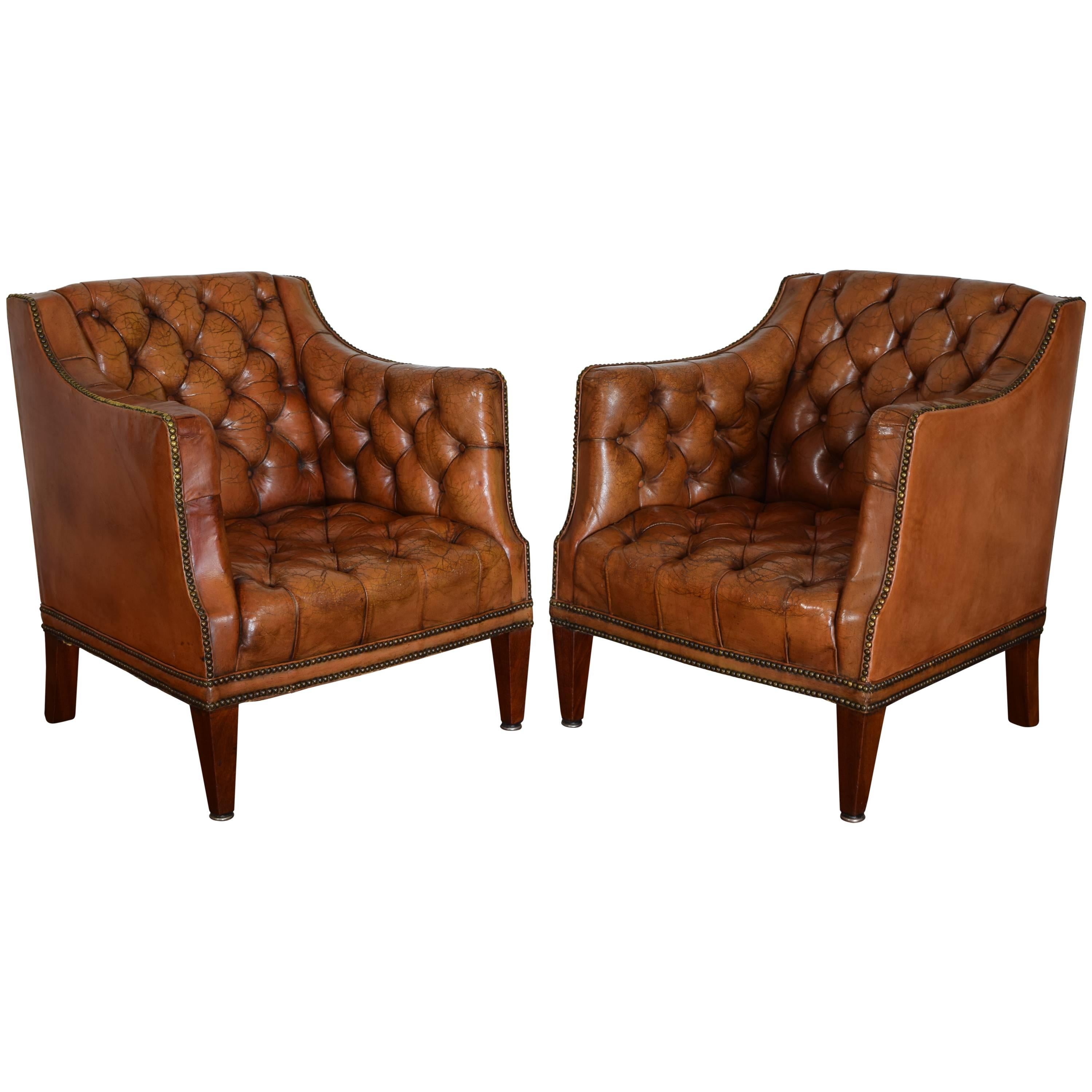 Pair of French Mahogany and Tufted Leather Upholstered Bergeres