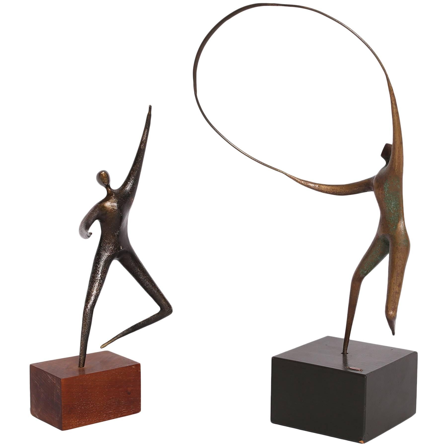 Pair of Curtis Jere Figural Sculptures
