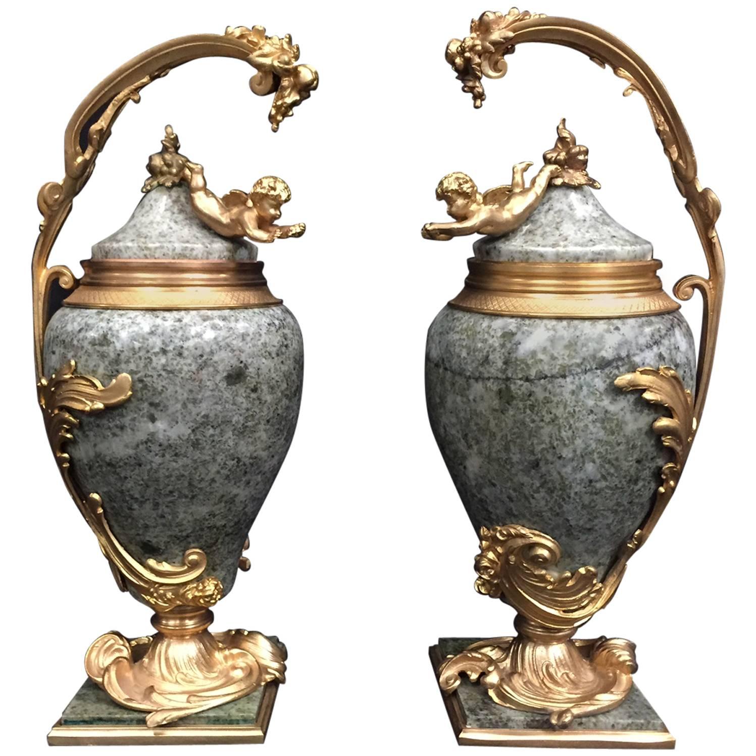 Pair of French Ormolu-Mounted Marble Urns with Cherubs