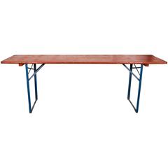 Used Folding Orange Picnic Table with Blue Metal Legs