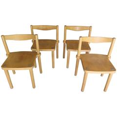 Four European Modern Stacking Chairs