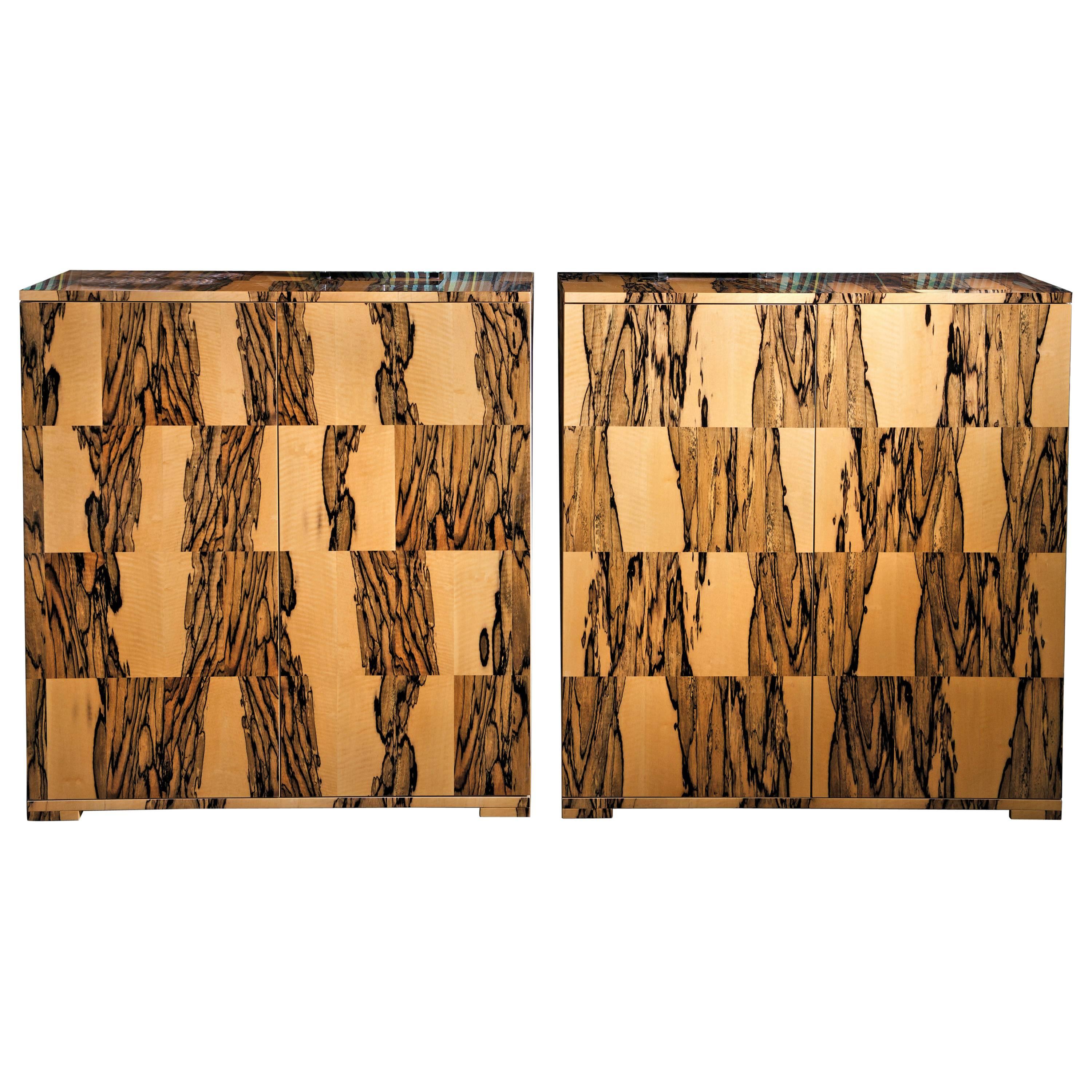 Exotic unique Italian Albin ebony timber veneer cabinet.
Design: Domenico Mula.
Two internal shelves - push pull opening.
Interiors: Semi gloss natural maple.

Measures: cm.100 x 45 x 106 H.
 