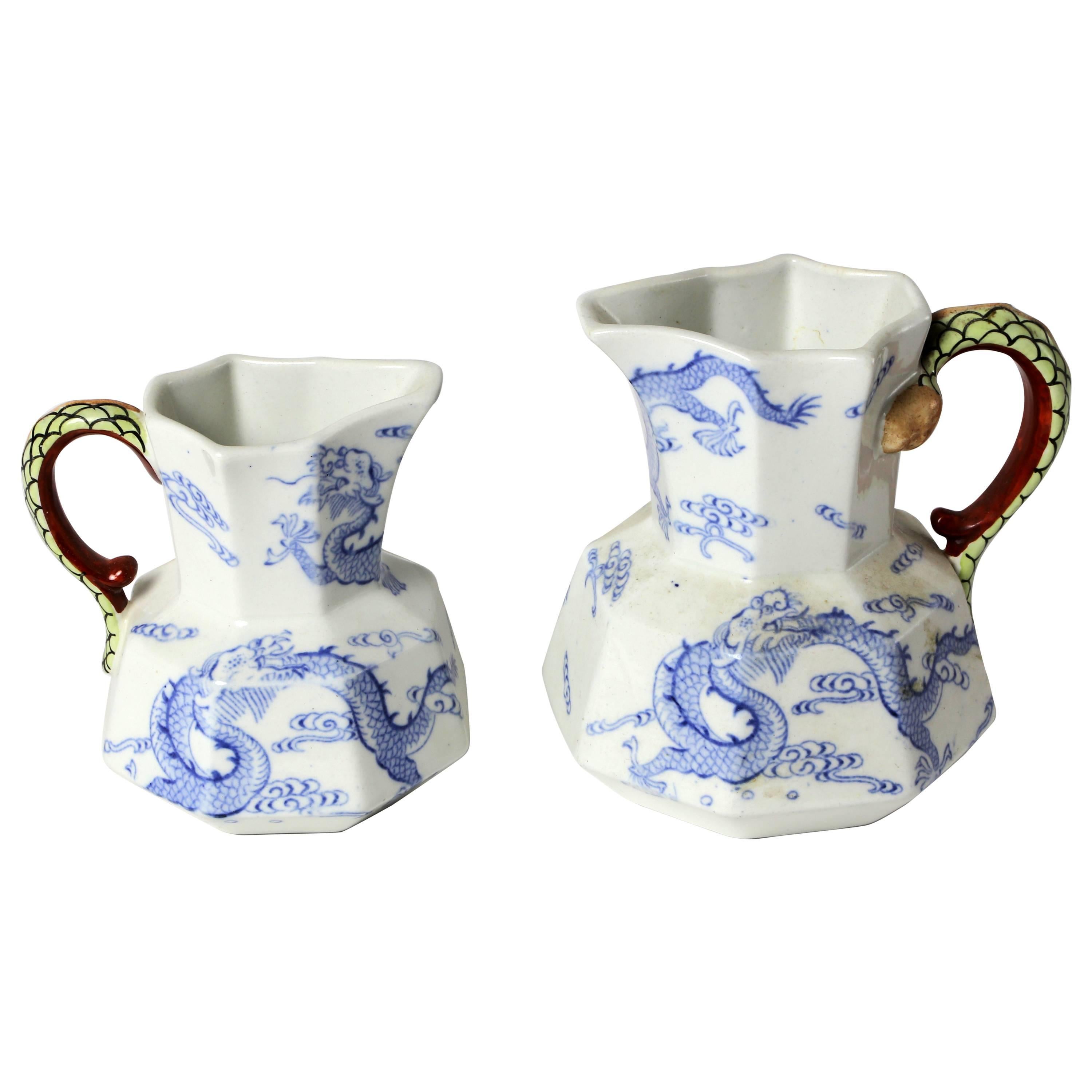 Two Ironstone Ewers in Blue Dragon Pattern with Green Handles For Sale