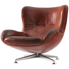 Illum Wikkelsø Swivel Lounge Chair in Brown Leather