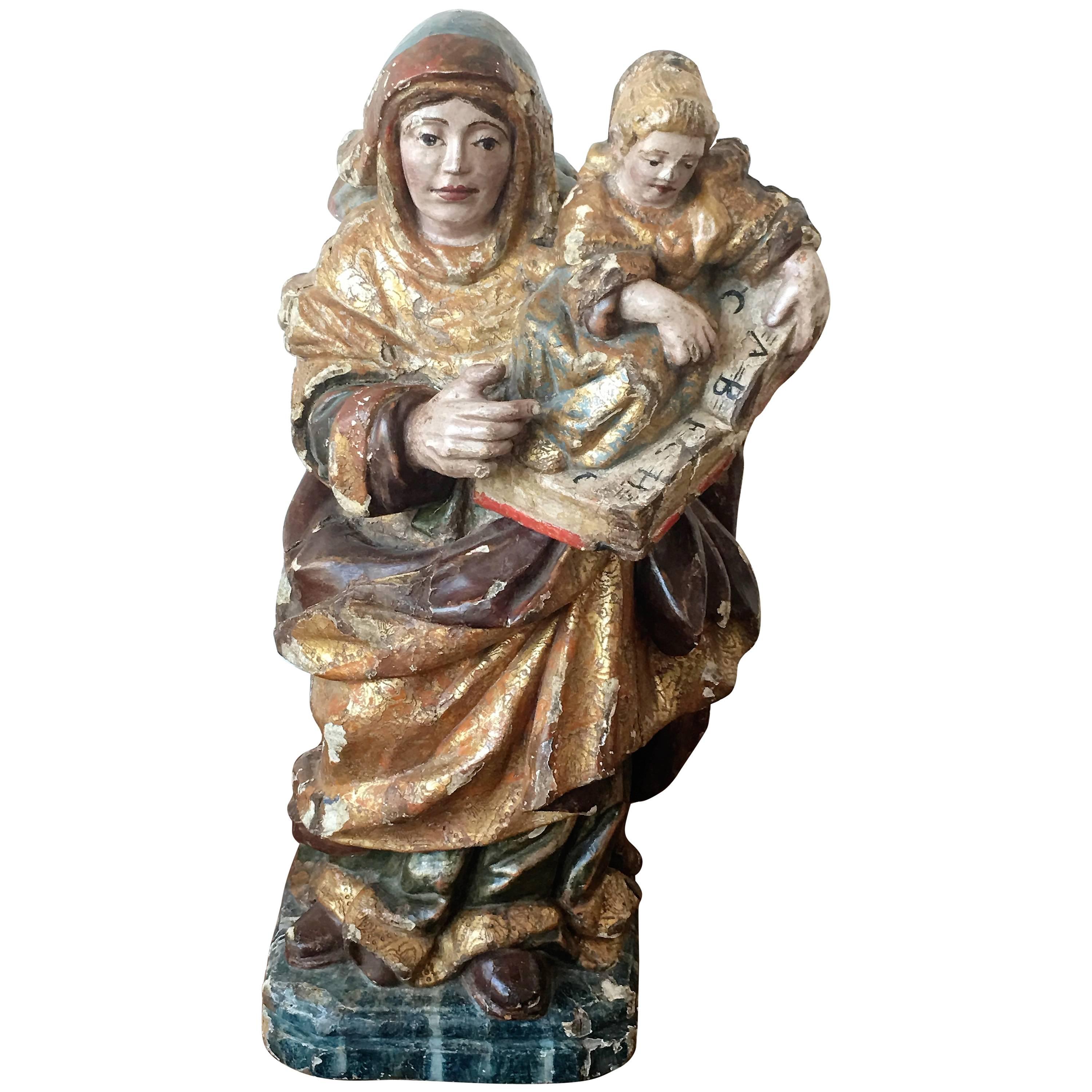 Spanische geschnitzte und polychrom bemalte Heilige Anne mit der kleinen Maria aus dem 16. Jahrhundert im Angebot